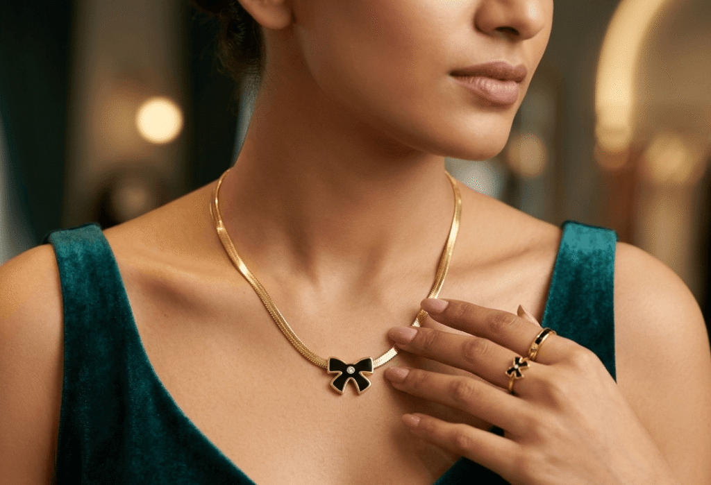 "Premium Butterfly Pendant Necklace Gold Snake Chain Jewelry Pakistan - Midnight Edition."